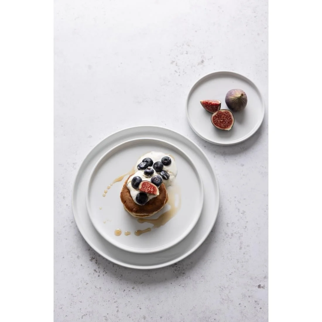 Olympia Whiteware Flat Round Plates 268mm (4 Pack) - Image 4